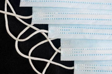 Background concept for news about the novel coronavirus COVID-19 pandemic, antiviral medical mask...
