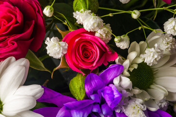 Background for a greeting card - beautiful gift bouquet of various colorful decorative summer flowers