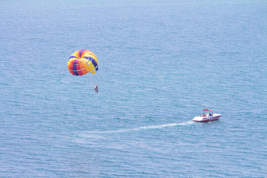Parasailing over the ocean 