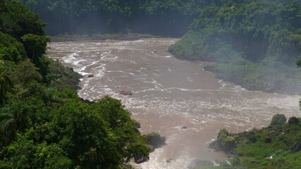 Fototapeta na wymiar Views of the spectacular Iguazu waterfall on a sunny day i from many points of view