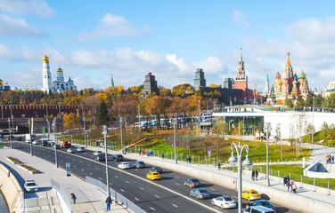 October 22, 2017 Moscow, Russia. Cars on Moskvoretskaya embankment, Zaryadye Park and a view of the Moscow Kremlin.