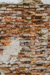 old ruins brick wall with concrete cracked