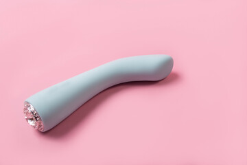 on a pink background sex product, toy for adults