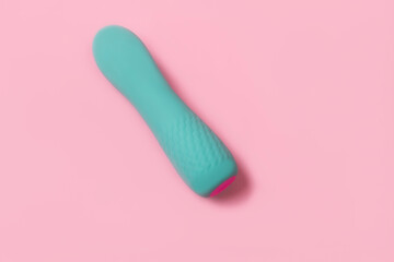 on a pink background sex product, toy for adults