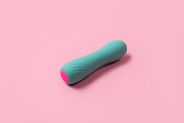 on a pink background sex product, toy for adults