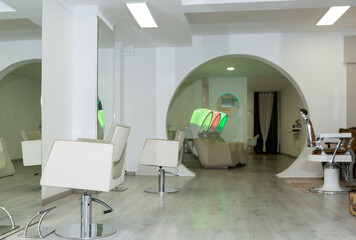 Fototapeta na wymiar Interior of modern light beauty salon
