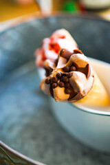 Ice cream in a white ceramic cup