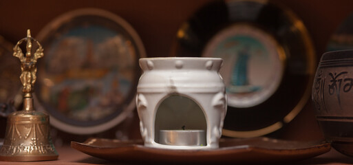 Fototapeta na wymiar White ceramic aroma lamp