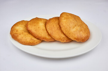 A sandwich sitting on top of a white plate