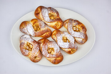 A white plate topped with a doughnut