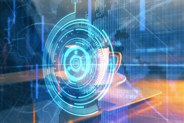 Double exposure of desktop computer and technology theme hologram. Concept of software development.