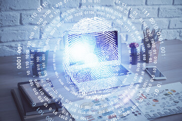 Computer on desktop in office with finger print drawing. Double exposure. Concept of business data security.