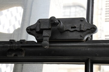 old iron gate with omen for key