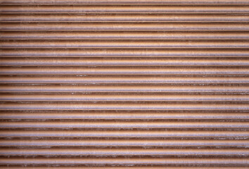 Brown metallic roller shutter door parallel background