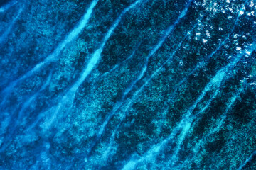 Seascape at the day time. Water as a background. Blue water background from top view. Sea and reef. Bali, Indonesia. Travel - image