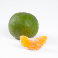 Orange with slice on white background
