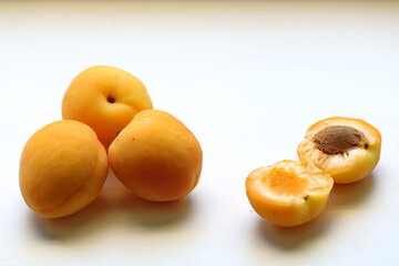 Apricot fresh, ripe. sweet. fragrant, on a white background, close-up. It has a wide variety of varieties.