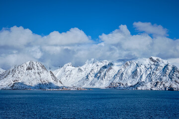 Lofoten islands and Norwegian sea in winter with snow covered mountains. Lofoten islands, Norway