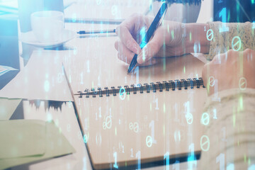 Double exposure of writing hand on background with data solution technology hologram. Ai concept.