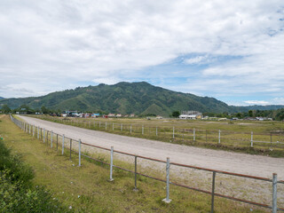 Fototapeta na wymiar Traditional Horse Race Track in the Meadow. Located in Takengon, Aceh, Indonesia.