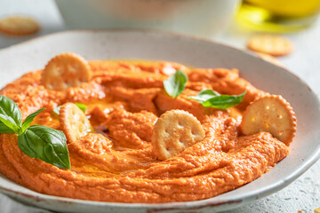 Tasty tomato hummus as healthy and quick snack