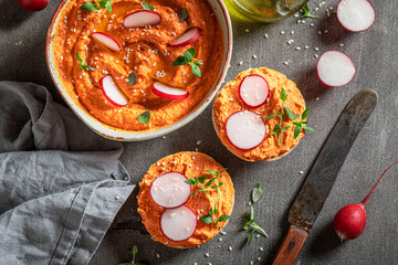 Fresh roll with hummus, radish and herbs