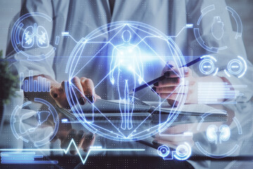 Education theme hologram over woman's hands writing background. Concept of study. Double exposure