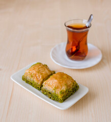 Turkish sweet baklava on plate.
