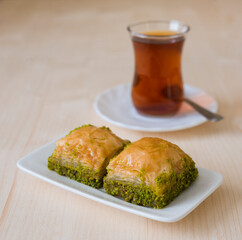 Turkish sweet baklava on plate.