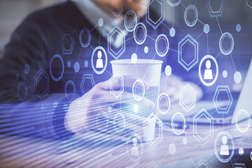 Media network theme hologram with man working on computer on background. Concept of internet communication. Double exposure.