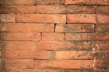Background of wide old red brick wall texture. Old Orange brick.