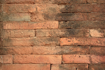 Background of wide old red brick wall texture. Old Orange brick.