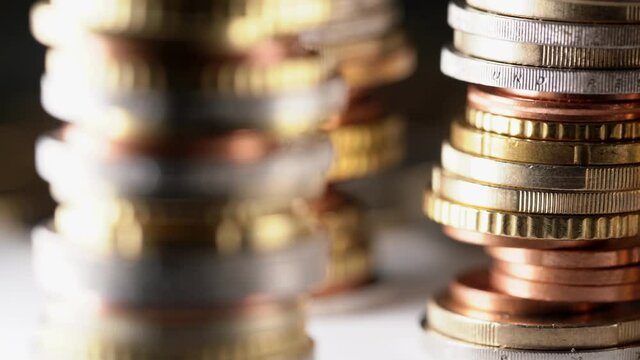Different Euro coins on each other. European currency closeup, copper coins