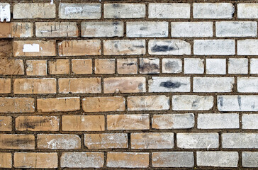 Texture of old brickwork with  silicate block in the mud