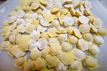 Russian traditional pelmeni with meat. Uncooked freshly made raw