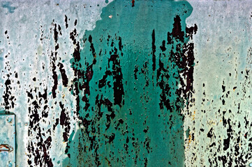 Texture of the old green paint on metal