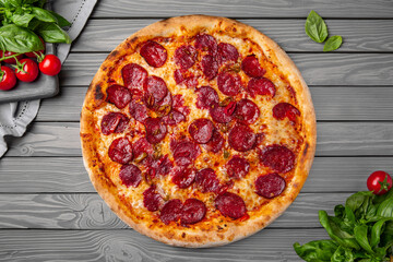 Tasty hot italian pizza Diabolo with pepperoni. Pizzeria menu. Concept poster for Restaurants or pizzerias. Top view