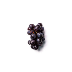 Top down view of red grapes isolated on white background.