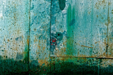 Texture of the old green paint on metal