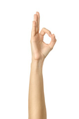Fototapeta premium Ok sign. Woman hand gesturing isolated on white