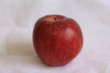 red apples on a wooden table