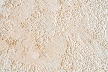 Texture of vanilla ice cream. Abstract beige surface. Sweet dessert.