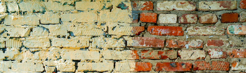 Red brick wall. Exterior of an old building. Vintage interior texture.