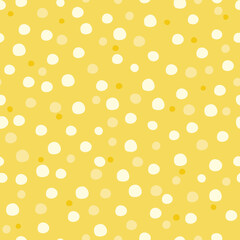 Vector cute medium snow polka dot seamless pattern on yellow background. 