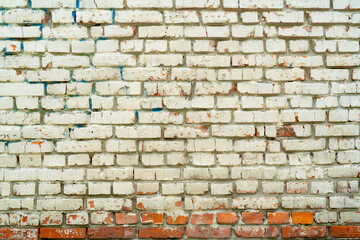 Red brick wall. Exterior of an old building. Vintage interior texture.