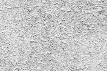 Gray rough plaster. Abstract building background. Surface of wall of building.