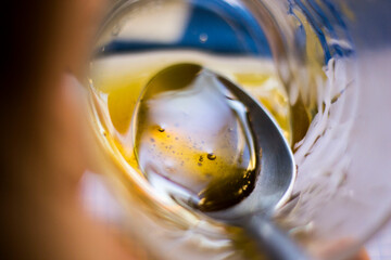 Honey in glass with spoon
