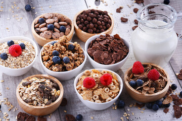 Bowls with different sorts of breakfast cereal products