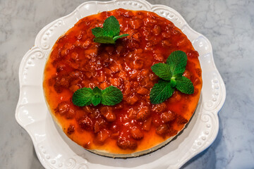 strawberry cheesecake ready for tea at dinner