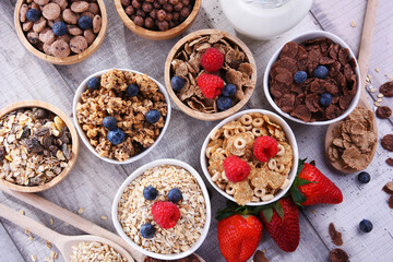 Bowls with different sorts of breakfast cereal products